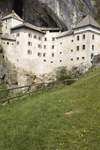 Predjama castle - from the fields, Slovenia - photo by I.Middleton