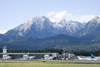 Slovenia - Brnik Airport: mountains and Terminal T1 of Ljubljana Joze Pucnik Airport - photo by I.Middleton