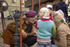 Slovenia - Kamnik Medieval Festival : minstrel sings to children - photo by I.Middleton