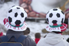 Confused spectators wearing football hats at the golden fox womens world cup slalom, Kranjska Gora, Slovenia - photo by I.Middleton