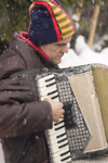 accordion - musician busking at Planica ski jumping championships, Letalnica, Slovenia - photo by I.Middleton