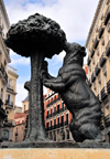 Spain / Espaa - Madrid: El oso y el madroo / city symbol - the bear and the arbutus at Puerta del Sol - sculptor Antonio Navarro Santaf - Calle del Carmen - photo by M.Torres