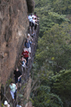 Sigiriya, Sri Lanka: tourists climbing to the rock fortress - photo by B.Cain