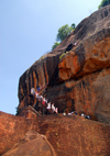 Sigiriya, Central Province, Sri Lanka: tourists on the stairs above the Lion Gate - Unesco World Heritage site - photo by M.Torres