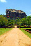 Sigiriya, Central Province, Sri Lanka: walking to the Lion rock - the magma plug from an ancient volcano - Unesco World Heritage site - photo by M.Torres
