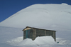 Svalbard - Spitsbergen island: Pyramiden: hut made of glass bottles - photo by A. Ferrari