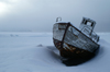 Svalbard - Spitsbergen island - Van Mijenfjorden: old boat in the snow - prow - photo by A. Ferrari