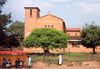 Swaziland - Manzini: red brick church and bus stop - photo by Miguel Torres