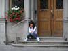 Switzerland - Stein am Rhein - canton of Schaffhausen: pensive girl on steps - photo by J.Kaman