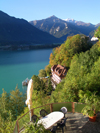 Ringgenberg, district of Interlaken, Berner Oberland, Switzerland: view from above on coffee shop table next to Brienz lake with mountains on the background - photo by E.Keren