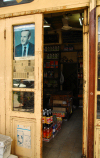 Damascus, Syria - Souq Midhat Basha - grocery door with Hafez al-Assad - photo by M.Torres / Travel-Images.com