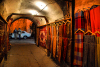 Damascus, Syria: carpets and clothes for sale - a passage at night - old town - photographer: M.Torres