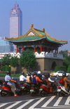 Taiwan - Taipei city - gate and scooters - photo by Bob Henry