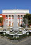 Dushanbe, Tajikistan: fountain and parliament of Tajikistan building, Dusti square - Supreme Assembly (Majlisi Oli) - Soviet architecture - photo by M.Torres