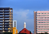 Dar es Salaam, Tanzania: TTCL Headquarters Extelecoms House, Heritage Motel and the minaret of the Friday Mosque - central business district - view from the waterfront - photo by M.Torres