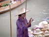 Thailand - Damnern Saduak Ratchaburi - Floating market: firl selling hats (photo by M.Bergsma)