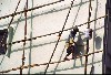 Thailand - Thailand - Ranong (Ranong province): painting with bamboo scaffolding (photo by Jordan Banks)