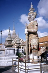 Bangkok / Krung Thep, Thailand: Wat Phra Kaeo - the most sacred Buddhist temple in Thailand - Thotsakhirithon, giant demon (Yaksha) guarding an entrance - photo by J.Kaman