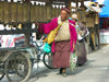 Tibet - Lhasa: temple - prayer wheels - man (photo by P.Artus)