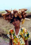 Manatuto district: girl wearing corn headgear