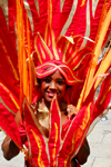 Port of Spain, Trinidad and Tobago: girl with flaming red costume during the carnival parade - photo by E.Petitalot