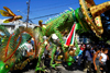 Port of Spain, Trinidad and Tobago: green reptile with a sombrero - Carnival in Port of Spain - photo by E.Petitalot