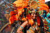 Port of Spain, Trinidad and Tobago: smiling woman in a very colorful costume at the carnaval parade - photo by E.Petitalot