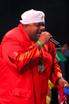 Port of Spain, Trinidad and Tobago: fat man is singing during the carnival - rapper - photo by E.Petitalot