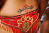 Port of Spain, Trinidad and Tobago: tattoo on the lower back of a Trinidad girl - photo by E.Petitalot