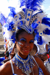 Port of Spain, Trinidad and Tobago: girl with white and blue feathers on the head during carnival - photo by E.Petitalot