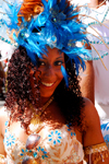 Port of Spain, Trinidad and Tobago: girl with curly hair and colourful feathers - carnival - photo by E.Petitalot