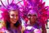 Port of Spain, Trinidad and Tobago: smiling girls with pink feathers - mulatto and white - carnival - photo by E.Petitalot