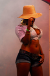 Port of Spain, Trinidad and Tobago: shorts and hat in fashion for a Trinidad girl - photo by E.Petitalot