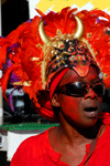 Port of Spain, Trinidad and Tobago: a man with devil head like a cap during carnival - African influence - mythology - photo by E.Petitalot
