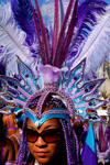 Port of Spain, Trinidad and Tobago: woman with colorful feather crown during carnival - the Big Yard - photo by E.Petitalot