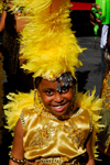 Port of Spain, Trinidad and Tobago: young girl in yellow costume playing mas (masquerade) - photo by E.Petitalot