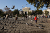 Istanbul, Turkey: chasing pigeons outside Istanbul University - photo by J.Wreford