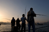 Istanbul, Turkey: fishermen the Bosphorus - photo by J.Wreford