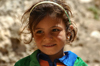 Harran, Turkey: smiling Arab girl - photo by C. le Mire