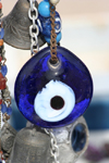 Turkey - Cappadocia - Goreme: good luck charm - evil eye - amulet - Porte-bonheur - bead - Nazar Bonjuk - photo by C.Roux