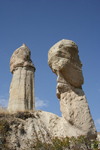 Turkey - Cappadocia - Valley of Love: twin fairy chimneys - basalt on sandstone - photo by C.Roux