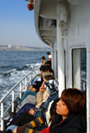 Istanbul, Turkey: time passes slowly for the passengers of skdar ferry - photo by M.Torres