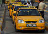 Istanbul, Turkey: yellow cabs - taxis in skdar square - skdar District - photo by M.Torres