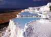 Pamukkale - Denizli province, Aegean region, Turkey: mineral springs of Pamukkale which contain calcium oxides left fantastic concretions on the travertine structures - photo by J.Fekete