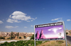 Cappadocia - Greme, Nevsehir province, Central Anatolia, Turkey: road side billboard for a UFO museum - photo by W.Allgwer