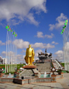 Ashgabat - Turkmenistan - gold-covered statue of President Saparmurat Atayevich Niyazov,Turkmenbashi - Akhalteke horses in the background - photo by G.Karamyanc / Travel-Images.com