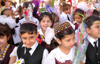 Turkmenistan - Ashghabat / Ashgabat / Ashkhabad / Ahal / ASB: Turkmen school children in national dress (photo by Karamyanc)