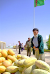 Turkmenistan - Ashghabat / Ashgabat / Ashkhabad / Ahal / ASB: melon day - old man and pile of melons - national holiday - fruit - photo by Karamyanc
