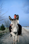 Turkmenistan - Boy and donkey (photo by G.Karamyanc)