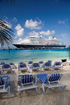 Grand Turk Island, Turks and Caicos: southwestern beach - deckchairs and Holland America cruise ship Prinsendam - photo by D.Smith